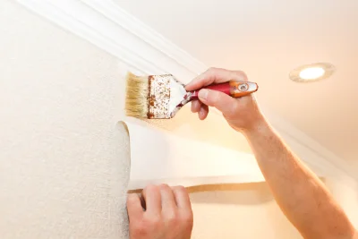 Pose de papier peint à Novillars — revêtements muraux et toiles de verre